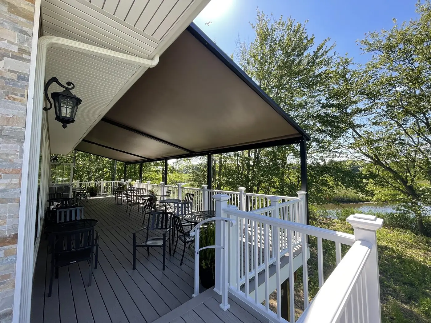 Corradi Frame tensioned track awning shading a deck