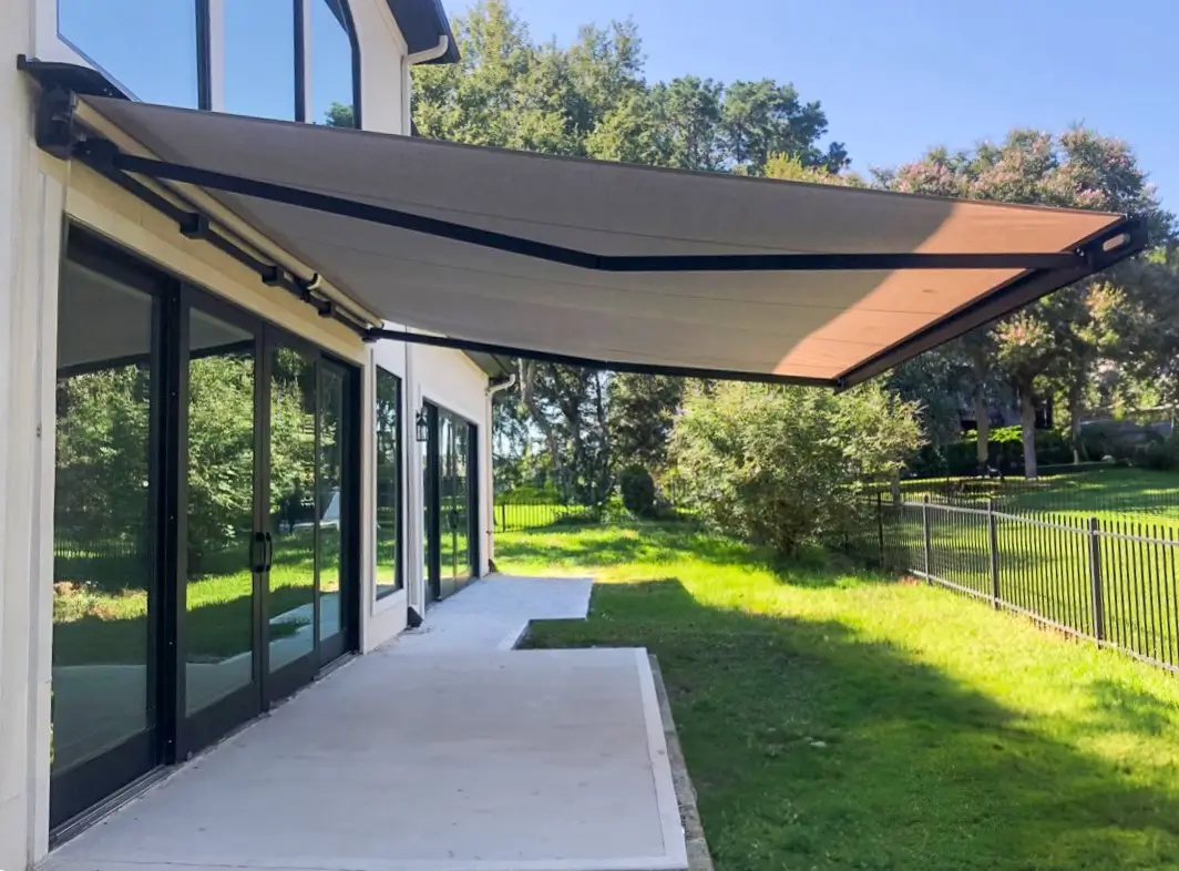 Corradi Svet retractable awning over a residential pool patio