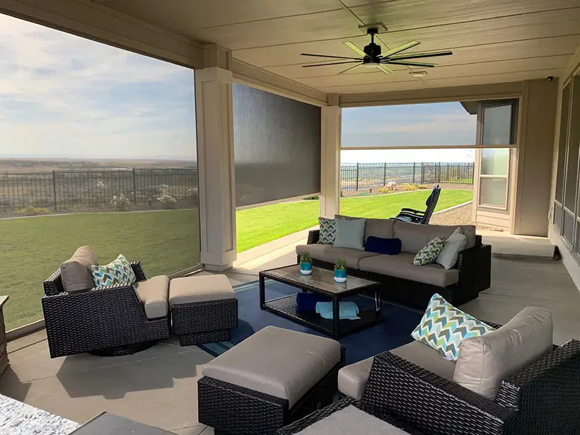 Corradi Vista open roll screens recessed into a covered patio